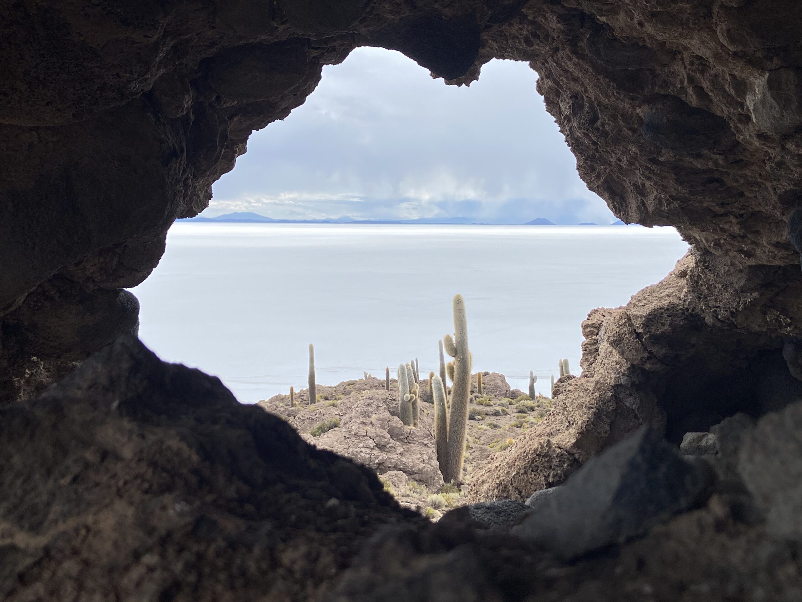 A volcanic island in the middle of a salt flat